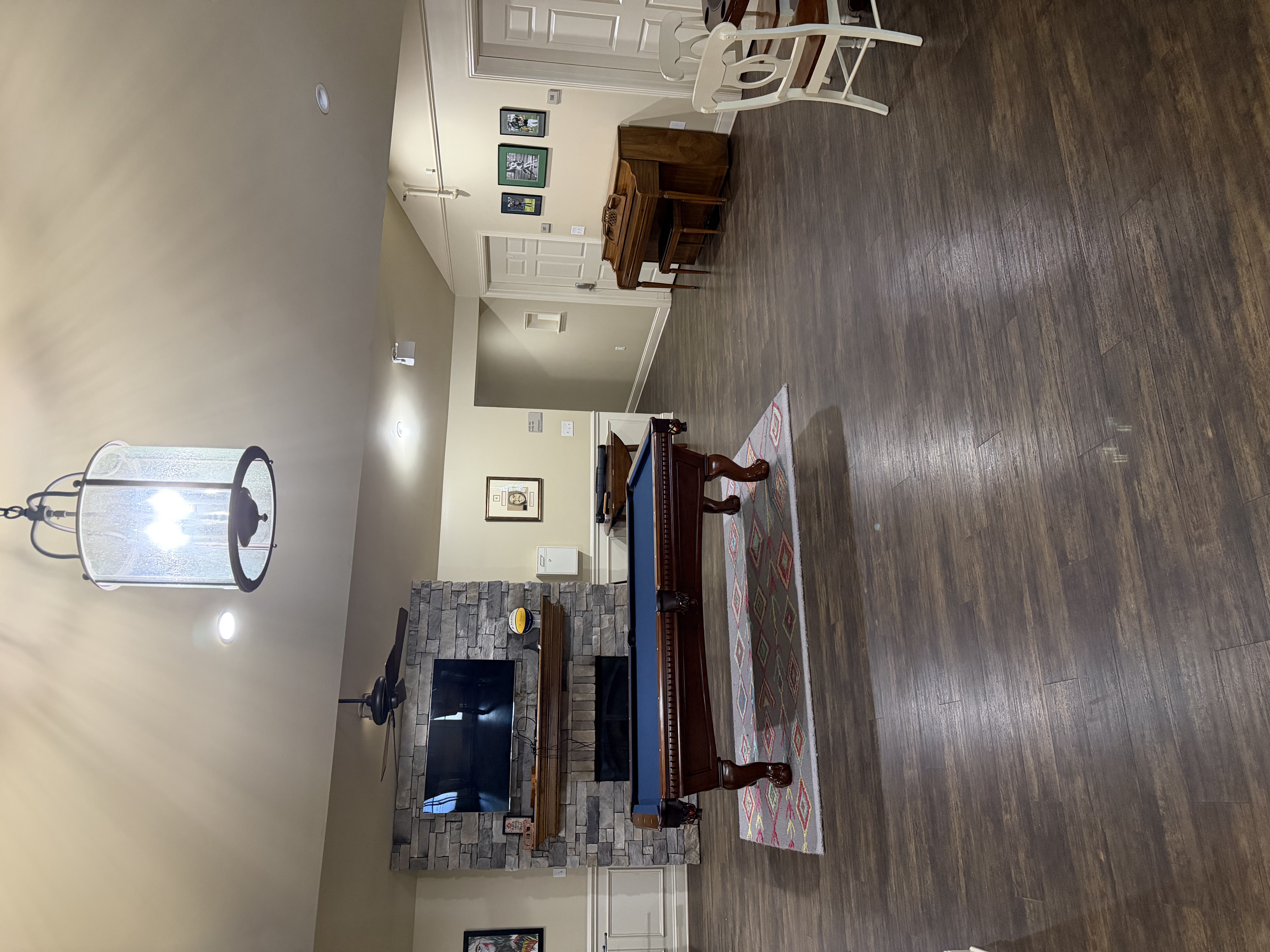 Common room at Shepherd's House with pool table and gathering space