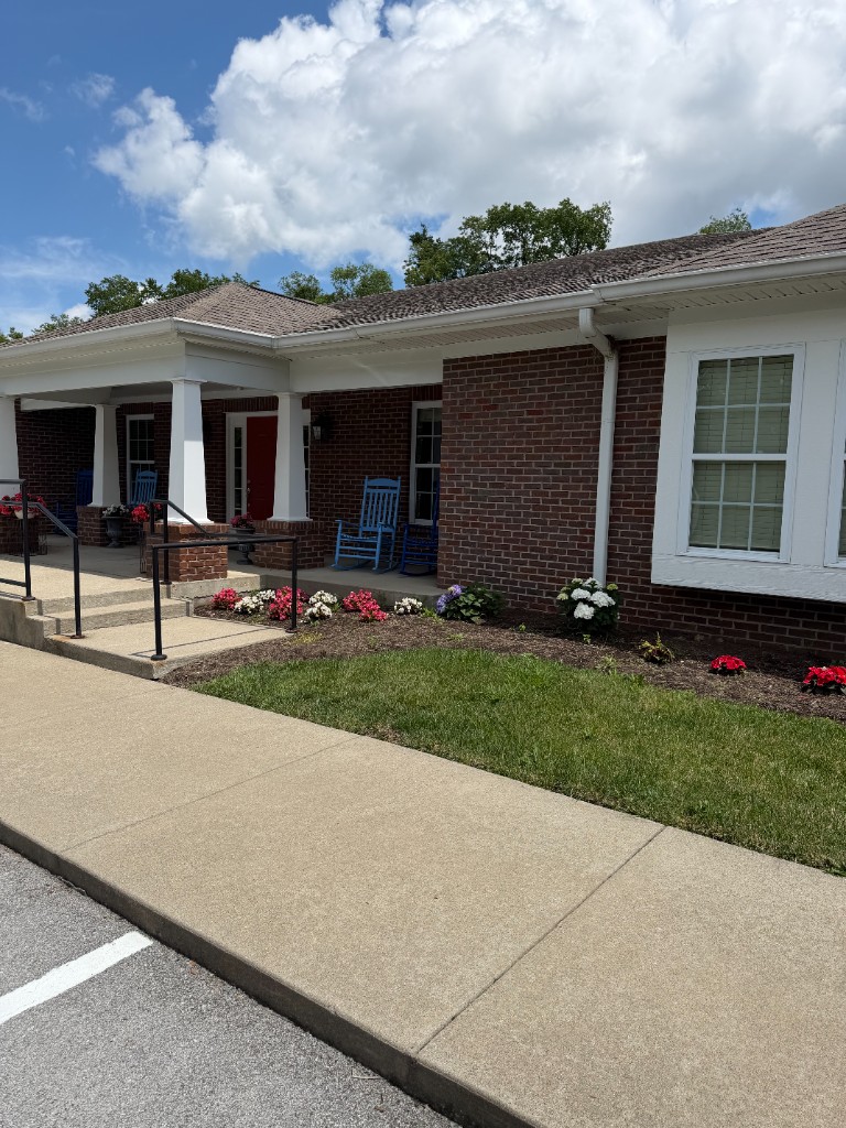 Shepherd's House community impact treatment facility with a welcoming covered porch