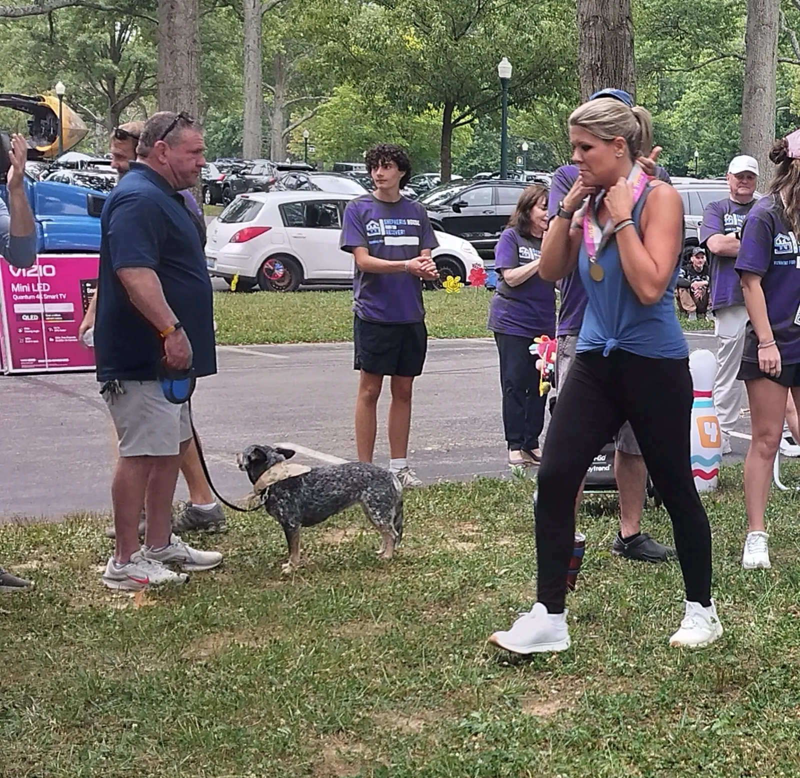 Run for Recovery participants and volunteers gathered on the lawn
